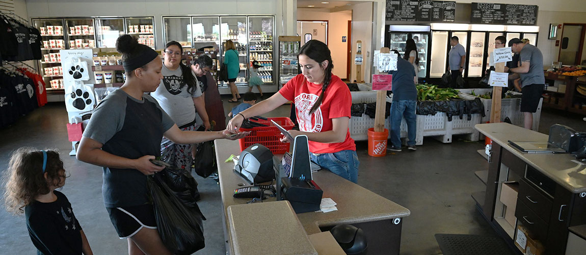 Customers paying at Gibson Farm Market